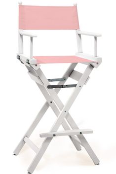 a red and white director's chair sitting up against a white background with no one in it