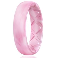 a pink ring with an intricate design on it