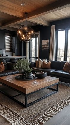 a living room filled with furniture and lots of windows