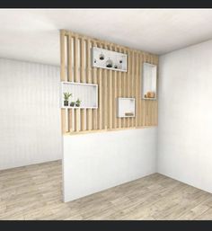 an empty room with white walls and wooden paneling on the wall is shown in this image