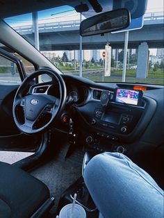 the interior of a car is shown with its dashboard and dash lights on, as seen from behind