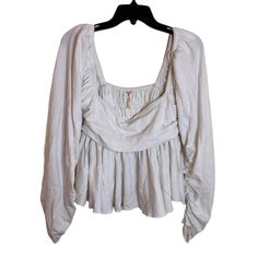 Free People Women's Smocked Squareneck Ruched Long Sleeve Peplum Top White Large Brand: Free People Department: Women Size: Large Color: White Style: Peplum Type: Top Pattern: Solid Material: 100% Cotton Condition: Brandnew Without Tags Features: Long Sleeve Ruched Sleeve Elastic Shoulder Gathered Ruffle Bottom Hem Smocked Back G1 Same/Next-Day Shipping Smoke-Free Home Items Purchased From Liquidation May Be De-Labeled Thank You For Shopping Join Live Shows On Thursday Friday Sunday 7pm Est White Top With Smocked Back For Fall, White Smocked Back Top For Fall, Flowy Smocked Bodice Top For Fall, Flowy Smocked Top For Daywear, Fall Smocked Top With Flowy Fit, Chic Smock Peasant Top For Fall, Chic Smocked Back Top With Lantern Sleeves, Fall Smocked Top With Flowy Bodice, Feminine Smocked Top With Gathered Neckline