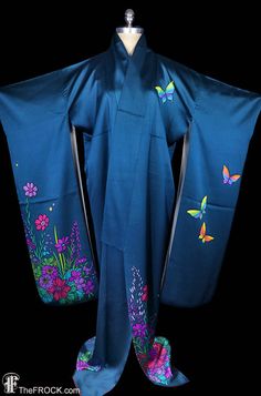 "www.TheFROCK.com www.CTMadrigal.com www.amazon.com/author/ctmadrigal Vintage teal silk furisode kimono robe, coat, or dressing gown teeming with colorful butterflies and flowers. Silk interior. Condition is excellent with age-appropriate wear. Measures about 46\" around when tied and 67\" long. Layaway is available. Age-appropriate wear on vintage and antique kimonos may include slight color variation or bleed on vintage and antique hand-dyed kimono textiles, light soil and/or discreet marks fr Blue Kimono Sleeve Robe For Festivals, Blue Robe With Kimono Sleeves, Blue Robe With Kimono Sleeves For Festival, Blue Kimono For Spring Tea Ceremony, Blue Silk Kimono For Wedding, Blue Silk Long Sleeve Kimono, Blue Silk Wedding Kimono, Blue Kimono With Kimono Sleeves For Tea Ceremony, Traditional Blue Kimono For Tea Ceremony