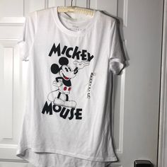 Disney Tee Medium Never Worn But No Tag Minnie Mouse Crew Neck Top For Disney Events, Minnie Mouse Crew Neck Top For Disney Trips, Casual Minnie Mouse Short Sleeve Shirt, Casual Short Sleeve Shirt With Minnie Mouse, Casual Tops For Disney Trips, Minnie Mouse Graphic Tee With Crew Neck, Minnie Mouse Graphic Tee Short Sleeve Top, Casual Mickey Mouse Crew Neck Top, Fun Mickey Mouse Tops For Disney Trips