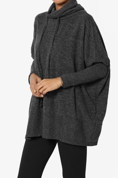 Make it an off-duty day in this cozy hacci melange knit pullover sweater. Crafted from soft sustainable yarns, this cozy-day sweater features a drawstring draped cowl neck and slouchy dropped shoulders. Wear it with leggings or skinny jeans and boots.Drawstirng slouchy turtle neck pullover sweaterCowl neck, Dropped shoulder dolman long sleeves, Ribbed sleeve and hemSoft melange hacci knit, oversized boxy poncho fitFits true to US size, however those who are between sizes should take the smaller Knit Oversized Sweater, Sweater Plus, Classic Sweater, Oversized Knitted Sweaters, Womens Turtleneck, Poncho Sweater, Knit Tunic, Knit Long Sleeve, Dream Style