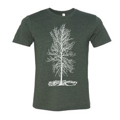 a green t - shirt with a white tree on it