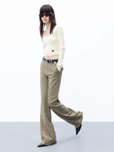 MO&Co. Women's High Waist Tailored Pants Feel confident and stylish with these tailored pants. Crafted from pure wool, with a straight-leg cut and a flattering drape, these pants feature a zip, hook and button closure as well as side pockets. Elevate your look with the perfect blend of sophistication and chic – pair them with a shorter top for a truly unique and fashionable ensemble. Features : - Straight cut with slightly wide hems- Zipper, hook and button closure- Double side pocket design Cod Fitted Wool Wide Leg Pants For Fall, Chic Wool Bottoms For Fall, Tailored Wide-leg Dress Pants For Fall, Chic Wool Dress Pants With Belt Loops, Spring Wool Wide-leg Pants, Fall Wool Ankle-length Pants, Fitted Wide Leg Pants For Winter, Chic Ankle-length Wool Dress Pants, Winter Fitted Ankle-length Wide Leg Pants