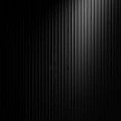 an abstract black and white background with vertical lines