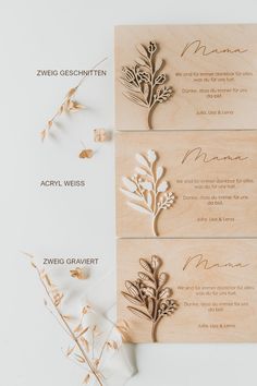 laser cut wood wedding stationery with flowers and leaves on the front, back and sides