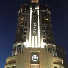 a very tall building lit up at night