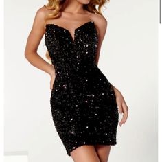 Size 12 New Never Worn Black Cocktail Or Homecoming Dress. Black Mini Length Sequin Prom Dress, Black Sequin Bodycon Dress For Prom, Black Mini Dress With Sequins And Fitted Bodice, Black Sequined Strapless Mini Dress, Black Strapless Dress For Prom Gala, Black Strapless Mini Dress With Sequins, Black Mini Dress For Prom And Gala, Black Mini Dress For Prom Gala, Chic Black Sequin Dress For Prom Season