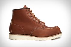 Much the same as the first moc-toe boots made by the company in the 1950s, the Red Wing Heritage Classic Moc Boot is a quality... Red Moc Toe Leather Work Boots, Red Wing Moc Toe Boots, Red Wing Blacksmith Boots, Red Wing Boots Blue, Vintage Red Wing Boots, Black Harness, Moc Toe Boots, Red Wing Boots, Red Wing