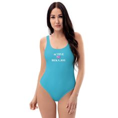 This one-piece blue swimsuit for all figures will bring out your best features. Enjoy the smooth fabric and the flattering design, and show it off by the sea or pool! * 82% Polyester, 18% Spandex * Fabric weight: 6.78 oz/yd² (230 g/m weight may vary by 5% * Chlorine-resistant fabric * Cheeky fit with a scoop neckline and a low scoop back * Zig-zag stitching * Double-layer front  * Four-way stretch material stretches and recovers on the cross and lengthwise grains This product is made especially Honeymoon Swimsuit, Mermaid Swimsuit, Blue One Piece, Matching Swimwear, White Swimsuit, Blue Swimsuit, Swimsuits For All, Cute Skirts, One Piece For Women