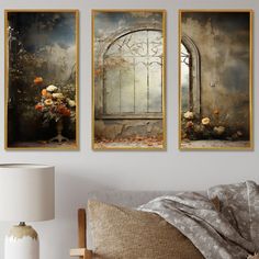 three paintings hanging on the wall above a bed