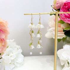 E189 lily of the valley white flower dangle earrings White Dangle Flower Earrings For Spring, Dainty White Dangle Flower Earrings, Feminine White Dangle Flower Earrings, Delicate Handmade Dangle Flower Earrings, White Crystal Flower Earrings For Gift, White Flower Crystal Earrings As Gift, White Crystal Flower Shaped Earrings For Gift, White Dangle Flower Earrings, Delicate White Crystal Earrings For Gift