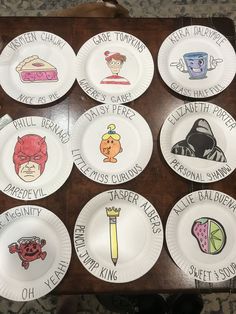 paper plates with different cartoon characters on them