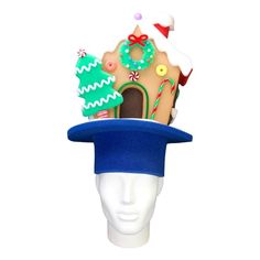 "Get this Awesome Christmas Gingerbread House Hat Today! This Christmas Gingerbread House Hat will definitely make you stand out at your next Party, Wedding, Corporate Event, Birthday, Quinceanera, or Halloween Party!  Product Details: ✓Made in the USA ✓Handmade ✓High Quality Foam ✓One Size Fits Most ✓Customizable to your preferences \"This is where your party starts\". Give your next party a new life and rediscover your youth with Foam Party Hats. Foam Party Hats Guarantee At Foam Party Hats we believe our hats help bring a new joy and excitement to the traditional party. Our products are made with love in Houston, Texas. We understand that buying things online can be scary with companies not staying true to their customers so we go the extra mile to keep you satisfied. If you bought some Diy Christmas Hats, Funny Christmas Hats, Christmas Headwear, Christmas Bride, Gingerbread Party, Bread Man, Crazy Hat Day, Foam Party, Christmas Craft Fair