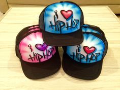 This listing is for 30 of our popular 2-color airbrush party favor hats. We'll airbrush the hats with your color choice  (an order can be split into two color schemes if preferred - such as 'guy' and 'girl' colors). Each hat is airbrushed with individual name, hashtag or word in black graffiti print. *Images demonstrate some of the colors we have to offer - however, we have just about every color available! Our hats are quality high crown snapback trucker caps that are one-size-fits-all, and wor Hip Hop Party Favors, 90s Hip Hop Party, Class Party Favors, Airbrush Ideas, Streetwear Hats, Roller Skating Party, Kylie Makeup, Party Favors For Adults, Airbrush Designs