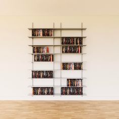 Wall Mounted DVD Storage Shelving Blu Ray Storage, Minimize Clutter, Blu Ray Collection, Dwell Magazine, Dvd Storage, Storage Shelving, Deep Shelves, Frame Shelf, Modern Shelving