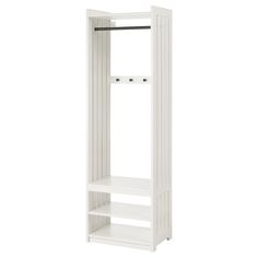 a tall white shelf with an open door