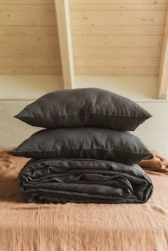 three pillows stacked on top of each other