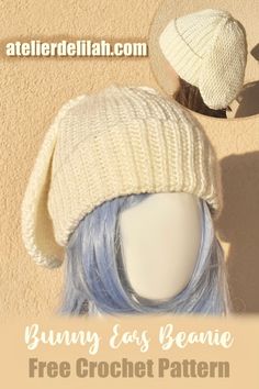 a white hat with blue hair on top of a mannequin's head