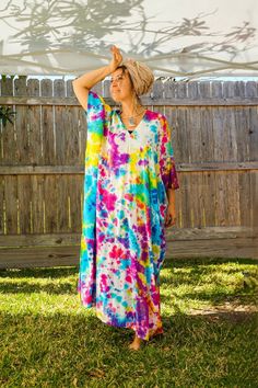 "Add a touch of unique style to your wardrobe with our Hand-Dyed Kaftan Dress! This stunning dress is made from 100% breathable and comfy rayon fabric, ensuring maximum comfort all day long. Using our unique method, each dress is carefully hand dyed, resulting in a one-of-a- kind masterpiece. The intricate patterns and vibrant colors make this dress a true work of art. The kaftan dress comes in a versatile one size fits most (M-3XL), making it extremely comfortable for a wide range of body types. With a bust measurement of up to 60\", you can feel confident that this dress will flatter your figure. The dress measures 55\" in length and 45\" in width, providing a loose and flowing fit that is both stylish and flattering. Featuring a trendy V-neck design and side slits, this slipover style d V-neck Maxi Dress With Natural Dye For Summer, Summer Tie-dye Maxi Dress With Natural Dye, Summer Tie-dye Natural Dye Maxi Dress, Hand Dyed Maxi Dress For Spring Vacation, Summer Tie Dye Maxi Dress With Natural Dye, Multicolor Relaxed Fit Maxi Dress For Summer, Hand Dyed Maxi Dress For Beach, Hand Dyed Maxi Dress For Festival, Casual Hand Dyed Maxi Dress For Festivals