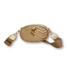 DESCRIPTION This versatile cross-body bag, is more than just a stylish accessory. The signature heart detail and two removable straps let you wear it multiple ways to fit your individual style. Carry it as a purse, shoulder bag, or even a clutch. FEATURES Genuine Leather Adjustable 5" x 7" Gold Heart Medida del cinturón: 42.5” Incluye correa y strap. Inspiration look Chic Heart-shaped Leather Bag, Leather Heart-shaped Bag With Adjustable Strap, Trendy Crossbody Bag Strap, Trendy Gold Shoulder Bag With Detachable Strap, Gold Detachable Crossbody Bag Strap, Gold Detachable Strap For Crossbody Bag, Trendy Bag Strap With Gold-tone Hardware, Chic Gold Crossbody Shoulder Bag, Trendy Crossbody Bag Strap As Fashion Accessory