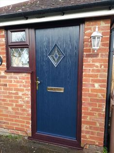 a blue front door to a brick building