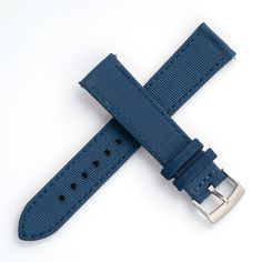 Crafted from durable sailcloth canvas with a leather underside, it is the ideal choice for outdoor enthusiasts or anyone looking for a strap that can withstand the rigors of daily wear. The leather ensures optimal comfort with its smooth texture and soft feel against the skin. Installation is easy thanks to the built-in quick release spring bars. While it may be stiff initially, it should break-in for a snug fit after just a few wears. Color: Blue with color matched stitchingMaterial: Sailcloth Casual Leather Watch Accessories For Outdoor, Leather Watch Bands For Outdoor, Adjustable Leather Watch Bands For Outdoor, Blue Watch Accessories With Leather Strap, Casual Leather Watch Accessories For Everyday Use, Adjustable Leather Strap Watch Band For Outdoor, Outdoor Leather Strap Watch Band, Blue Watch Accessories With Adjustable Leather Strap, Blue Adjustable Leather Strap For Watch