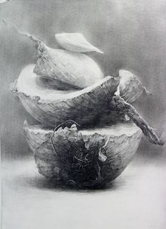 a black and white photo of some kind of bowl with fruit on it's side