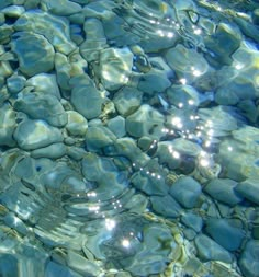 the water is crystal blue and clear with little ripples on it's surface