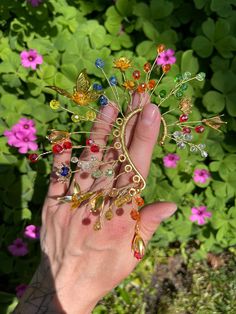 Gold Bohemian Ear Cuff For Party, Whimsical Adjustable Ear Cuff As Gift, Whimsical Adjustable Ear Cuff For Gift, Gold Bohemian Ear Cuff With Ear Wire, Bohemian Wire Wrapped Ear Cuff For Party, Fantasy Style Single Ear Cuff As Gift, Bohemian Gold Ear Climbers As Gift, Handmade Gold Ear Cuff For Festival, Handmade Fairycore Ear Cuff As Gift