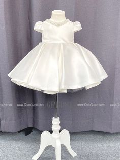 10% off now|Free shipping world-wide. Beaded Neckline Ruffle Satin Ballgown Flower Girl Dress for Wedding at GemGrace. Click to learn our pro custom-made service for wedding dress, formal dress. View #FlowerGirlDresses for more ideas. Princess Style Satin Ball Gown For Pageants, Elegant Satin Princess Dress For Pageant, Elegant Satin Princess Dress With Ruffles, Elegant Satin Princess Dress For Wedding, First Communion Satin Dress With Satin Bow, Satin First Communion Dress With Satin Bow, Princess Style Satin First Communion Dress, Wedding Princess Dress With Ruffles In Satin, Elegant Ball Gown With Satin Bow For Pageant