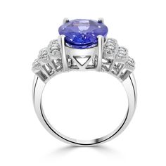 13x10 Violetish Blue AAAA Tanzanite Ring Oval shape 5.63 ct with 0.23 cttw Diamond in 14K White Gold Product Information SKU TT7317/5 Metal Type 14K Metal Color White Gold Ring Style - Primary Stone Gemstone Name Tanzanite Gemstone Species Zoisite No. Of Gemstones 1 Gemstone Shape Oval Gemstone Weight 5.63 Gemstone Size 13x10 Origin Tanzania Secondary Stone Gemstone Name Diamond Gemstone Species Diamond No. Of Gemstones 18 Gemstone Shape Round Gemstone Weight 0.23 Gemstone Size - Origin - Oval Tanzanite Diamond Ring In White Gold, Oval Diamond Ring In White Gold With Gemstone Accents, Oval Tanzanite Diamond Ring With Accent Stones, Oval Tanzanite Diamond Ring For Anniversary, Oval Tanzanite Ring With Brilliant Cut, Oval Diamond Ring With Gemstone Accents For Formal Occasions, Oval Tanzanite Ring In White Gold, Oval Tanzanite Rings Fine Jewelry, Oval Amethyst Ring With Tanzanite Accent Stones