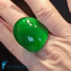 "Elegant band ring with a full green color, handmade of Murano glass. Each glass jewel is shipped in a rigid gift box, with the possibility of attaching your own greeting card. Each of our rings is engraved with the word \"Murano glass\" to make it authentic and unique. If this is not the ring for you, we have many others in our Etsy shop https://www.etsy.com/it/shop/LaFondazioneMurano?section_id=27677179 They are available in IT sizes 14 to 22 and US 6 1/2 to 10. If you don't know your size please send us a message.  All the rings of La Fondazione - Handmade Murano glass Venice are individually handmade with ancient Venetian art by our glass masters and only with authentic certified Murano glass rods. The glass processing is embellished with materials such as a gold leaf, both white and y Green Glass Jewelry As A Gift, Green Glass Jewelry As Gift, Handmade Green Rings For Party, Green Glass Jewelry Gift, Handmade Glass Rings For Gift, Modern Glass Rings Suitable For Gifts, Modern Resin Rings For Gifts, Handmade Murano Glass Jewelry Gift, Bohemian Murano Glass Jewelry Gift