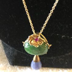 New Never Worn Gia By Sugar Tanzanite,Burmese Jade,Ruby Necklace.Gold Over Necklace With Genuine Gemstones.Comes In Original Box.No Returns Elegant Flower Pendant Necklaces With Natural Stones, Luxury Jade Necklace For Formal Occasions, Formal Fine Jewelry Jade Necklace, Elegant Emerald Necklace With Natural Stones For Formal Occasions, Elegant One Of A Kind Briolette Necklaces, Elegant One Of A Kind Briolette Necklace, Handmade Emerald Necklace For Formal Occasions, Handmade Elegant Oval Emerald Necklace, Elegant Oval Emerald Necklace With Natural Stones