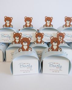 there are many small boxes with teddy bears on them in the shape of candy bars