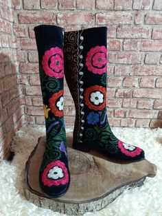 Handembroidered genuine leather custom made women boots. #womenboots #suzaniboots #vintageboots #ridingboots #bohostyle #bootslover #valentinasday #festivaldress #outdoorfit #handmade #turkishboots #giftforher #fashion #designer #bemyboots Embroidered Winter Festival Boots, Winter Festival Embroidered Boots, Bohemian Embroidered Boots With Round Toe, Bohemian Embroidered Round Toe Boots, Embroidered Leather Knee-high Boots, Bohemian Embroidered Boots For Festival, Bohemian Knee-high Boots For Festivals, Handmade Bohemian Festival Boots, Traditional Embroidered Boots For Festival