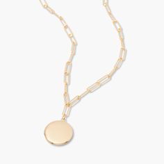 Need a beautiful way to keep a special memory close to your heart? This 14k gold covered elongated link locket is the necklace for you. Have your locket engraved with the initials of your or a loved one’s name. A timeless piece of jewelry that is a favorite with women of all ages that combines classic design with a modern edge. Available in 14k gold plated brass 3/4" locket 18" elongated link paperclip chain with 2" extender Lobster claw closure Made in the USA With engraving this item is FINAL Elegant Gold Locket Necklace With Oval Link, Oval Link Locket Necklace For Anniversary, Wedding Locket Necklace With Oval Link, Classic Engraved Locket Necklace With Oval Link, Classic Yellow Gold Oval Link Locket Necklace, Gold Link Locket Jewelry, Elegant Personalized Oval Link Locket Necklace, Elegant Personalized Oval Locket Necklace, Yellow Gold Oval Link Locket Necklace