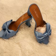 Unitary Baby Blue Heel Sandals With Bow And Clear Strap To Hold In Place. 4 Inch Heel. Size 6.5 New Cute Summer Heels For Formal Occasions, Light Blue Sandals For Spring Party, Light Blue Party Sandals For Spring, Blue Sandals For Spring Party, Blue Sandals For Party In Spring, Light Blue Synthetic Sandals For Evening, Cute Blue Round Toe Sandals, Trendy Light Blue Party Sandals, Adjustable Blue High Heel Sandals