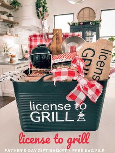 a black basket with red and white checkered ribbon on it that says license to grill