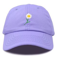 A daisy is a sacred symbol of new beginnings, innocence and delight. Often an inspiration directing to values of beauty, color and sensitivity, this flower sends a message of positivity. A perfect gift for those whose personality brings sunshine to life and the world around them. Express yourselves with our 100% cotton cap in a great style that lasts over time. With our soft padded sweat band, this hat fits very well without aggravating the skin. Features Adjustable Size Buckle Strap, Soft inner Purple Hat As A Spring Gift, Purple Hat For Spring As A Gift, Purple Hat For Spring Gift, Flower-shaped Spring Hat For Gifts, Purple Spring Gift Hats, Spring Purple Snapback Baseball Cap, Purple Snapback Baseball Cap For Spring, Adjustable Flower Hat As A Gift, Adjustable Lavender Hat For Spring