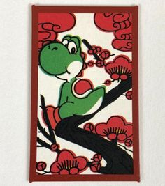 a card with an image of a frog on a tree branch in front of red and white flowers