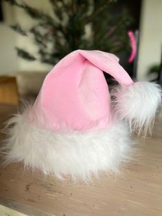 Baby pink / pastel pink Santa hat  Fits loosely on my 3 year old.  Perfect on female adult and can fit on my husband's head also!  Made from -super soft mink fabric  -faux fur white  Hat is lined with interfacing so you can stand straight up or bend for a slouch style hat All handmade by me Pink Santa Hat, Baby Rosa, Pink Santa, Hat Fits, Rose Pastel, Leather Skin, Pink Pastel, White Hat, White Faux Fur