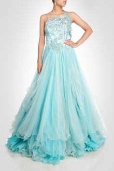 This stunning gown is in sky blue color. Three layers of net giving it stunning look. Inner layer is made of satin silk. Yoke is made of zardozi work in silver color. Customization accepted. Made to order Light Blue Tulle Gown For Wedding, Light Blue Floor-length Gown For Debutante Ball, Light Blue Anarkali Wedding Gown, Light Blue Anarkali Gown For Wedding, Anarkali Light Blue Gown For Wedding, Wedding Anarkali Gown In Light Blue, Light Blue Organza Gown For Wedding, Light Blue Organza Wedding Gown, Blue Organza Wedding Gown