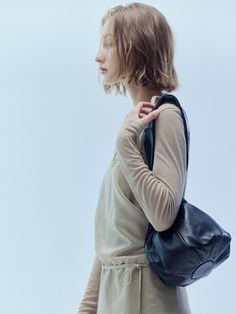 Editor's NotesYURT's unique bucket bag for an effortless look- A silhouette that resembles the shape of a fig- Flower shaped bottom that holds the bag's shape- Multi-styling possible as a cross-body/tote- Two different lengths of straps that can be interlocked for bag closureMeasurements(in.)One size- Body: 7.87 in. (Upper W) / 9.06 in. (Bottom W) / 11.81 in. (H)- Strap: 12.40 in. (Long) / 3.54 in. (Short)Composition & Care- Sheepskin leather- Natural leather may have fine scratches and wrinkles- Avoid direct heat and moisture- Wipe off moisture and stains with a dry cloth- Keep in a dust bagDesigner- by YURT Contemporary Shoulder Bag With Removable Pouch For Everyday, Contemporary Everyday Shoulder Bag With Removable Pouch, Contemporary Bags With Removable Pouch For Everyday, Contemporary Everyday Bags With Removable Pouch, Contemporary Bag With Removable Pouch For Everyday, Contemporary Everyday Bag With Removable Pouch, Modern Travel Hobo Bag With Bucket Shape, Modern Travel Hobo Bag In Bucket Shape, Modern Everyday Hobo Bag In Bucket Shape