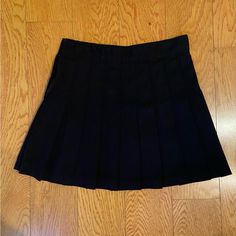 Brandy Melville Black Pleated Mini Skirt Size Small And Never Worn. Side Zipper. Cute Black Skirt #Brandymelville #Blackskirts #Johngalt #Preppy #Boho Black Fitted Skort For School Uniform, Black Mini Skirt For School, Black Lined Skort For School Uniform, Fitted Black Skort For School Uniform, Black Short Skirt For School, Black School Uniform Tennis Skirt, Black Mini Skort For School Uniform, Black Lined Pleated Skirt For School, Black Pleated Skirt For School Uniform