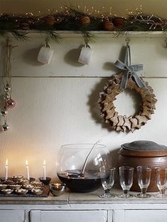 a collage of photos with candles, cookies and other items on the counter top