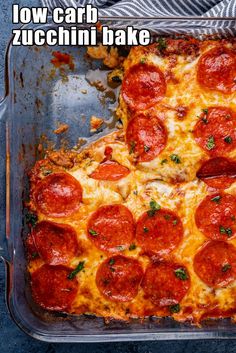 a pepperoni pizza in a pan with the words low carb zucchini bake